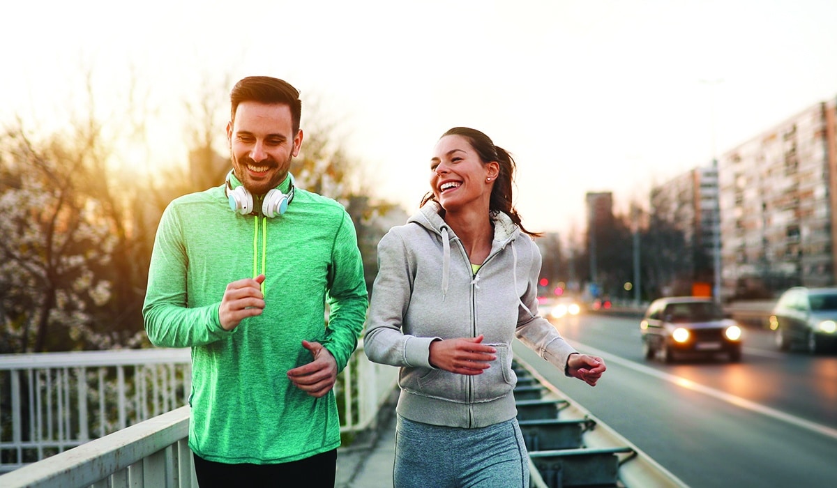 Couple jogging outdoors Aesthetic Enhancement at Winter Park Regenerative Medicine
